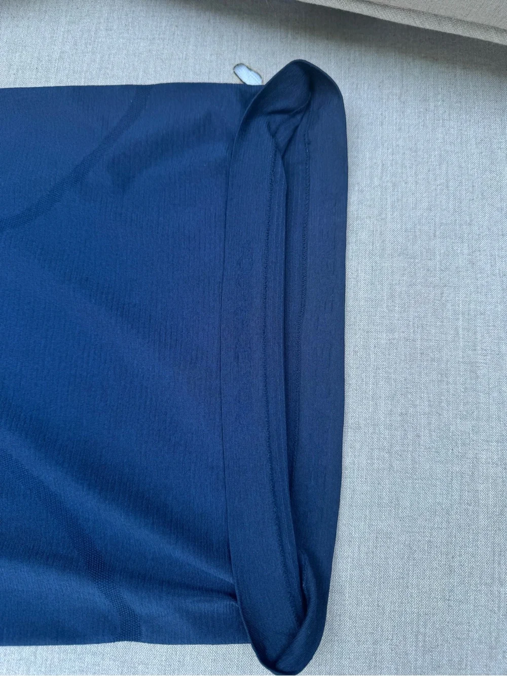 Navy Athleta shirt with White Ironman Logo
